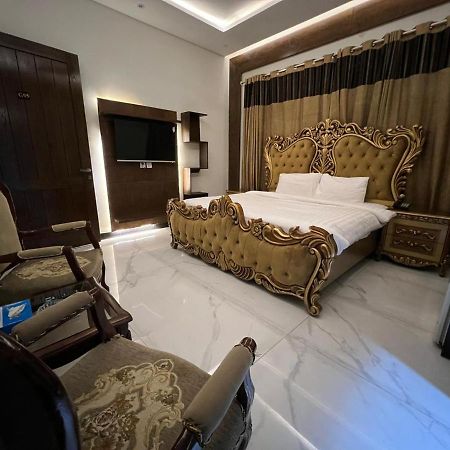Palm Tree Hotel Лахор Экстерьер фото